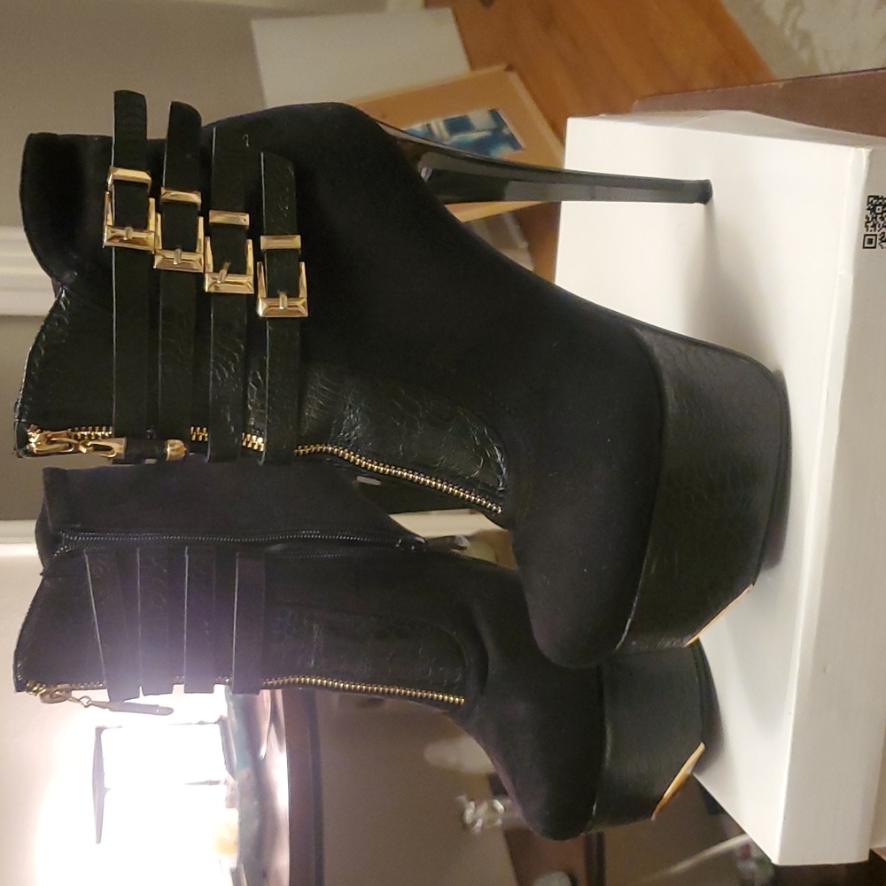 Black suede boots.